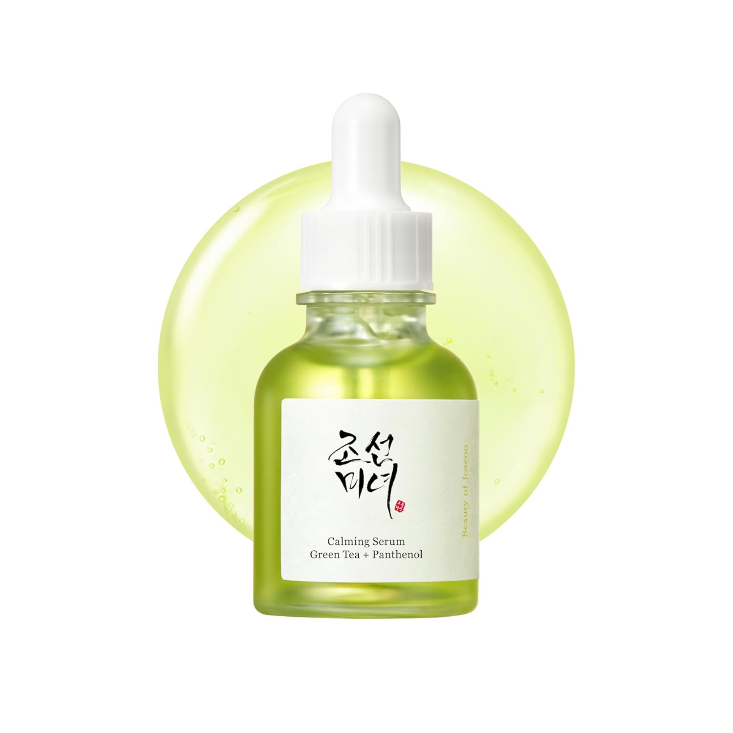 Skincare serum bottle with green liquid and white label on a white background