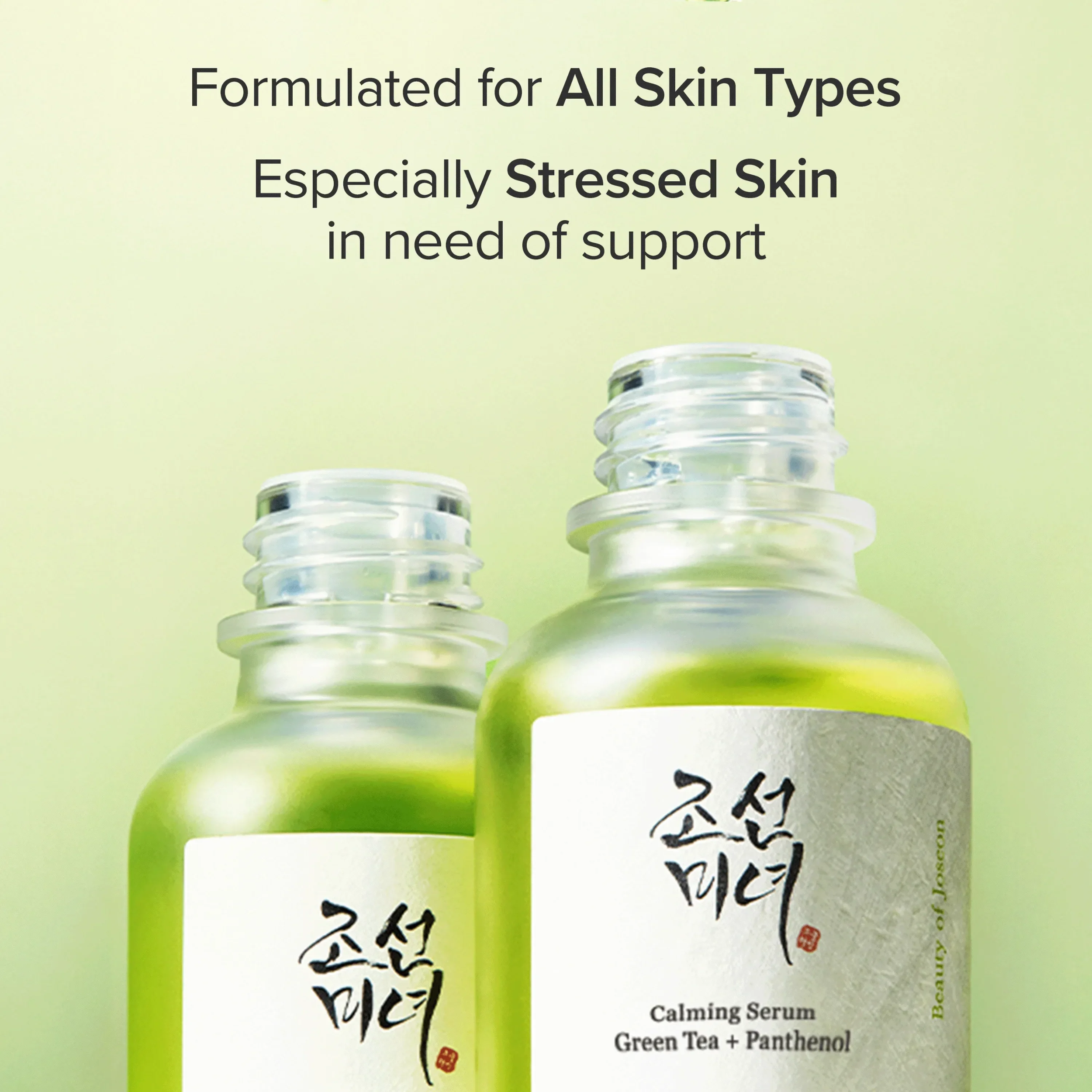 Two bottles of a skincare serum with a green background and text about skin types.