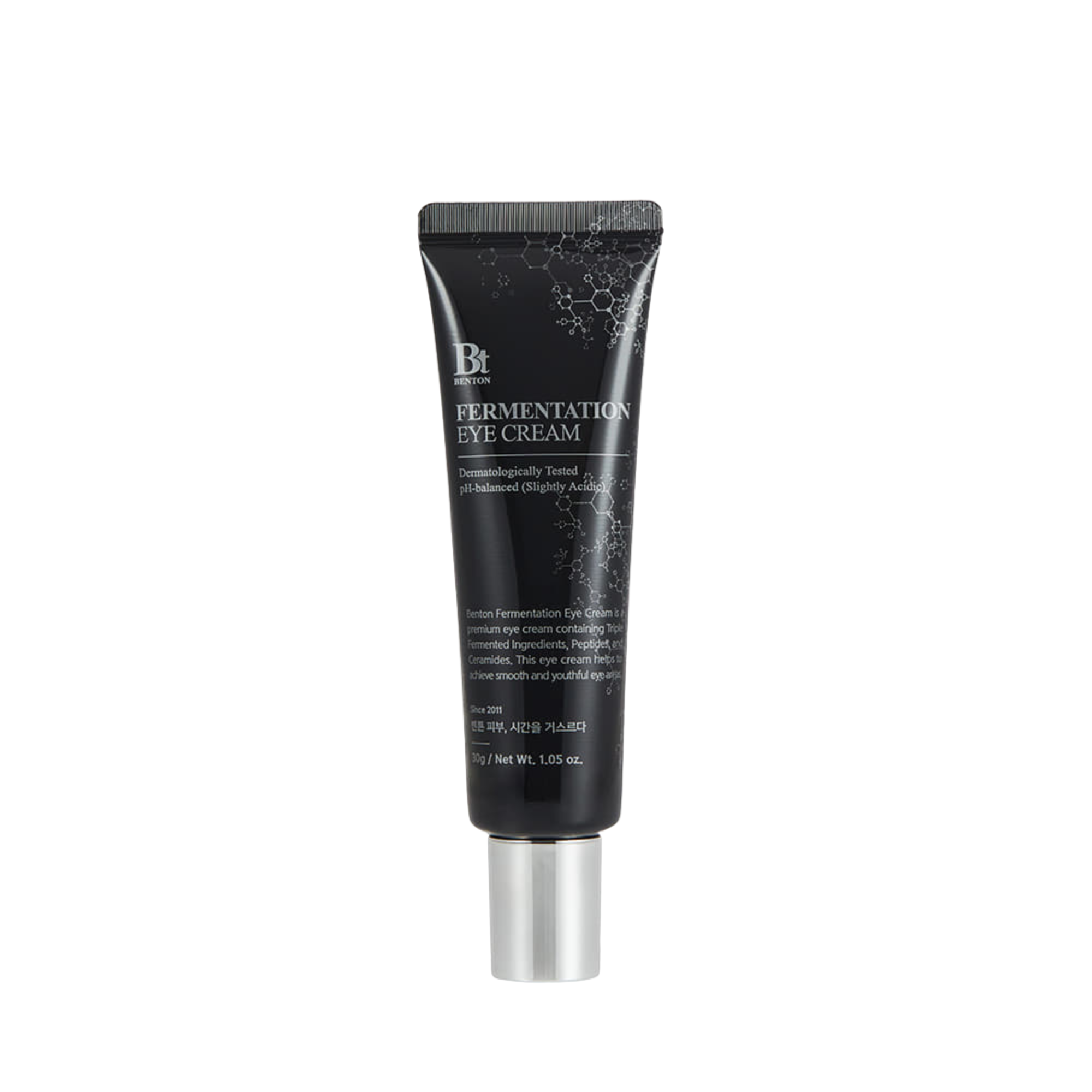 Black eye cream tube with silver base on a white background