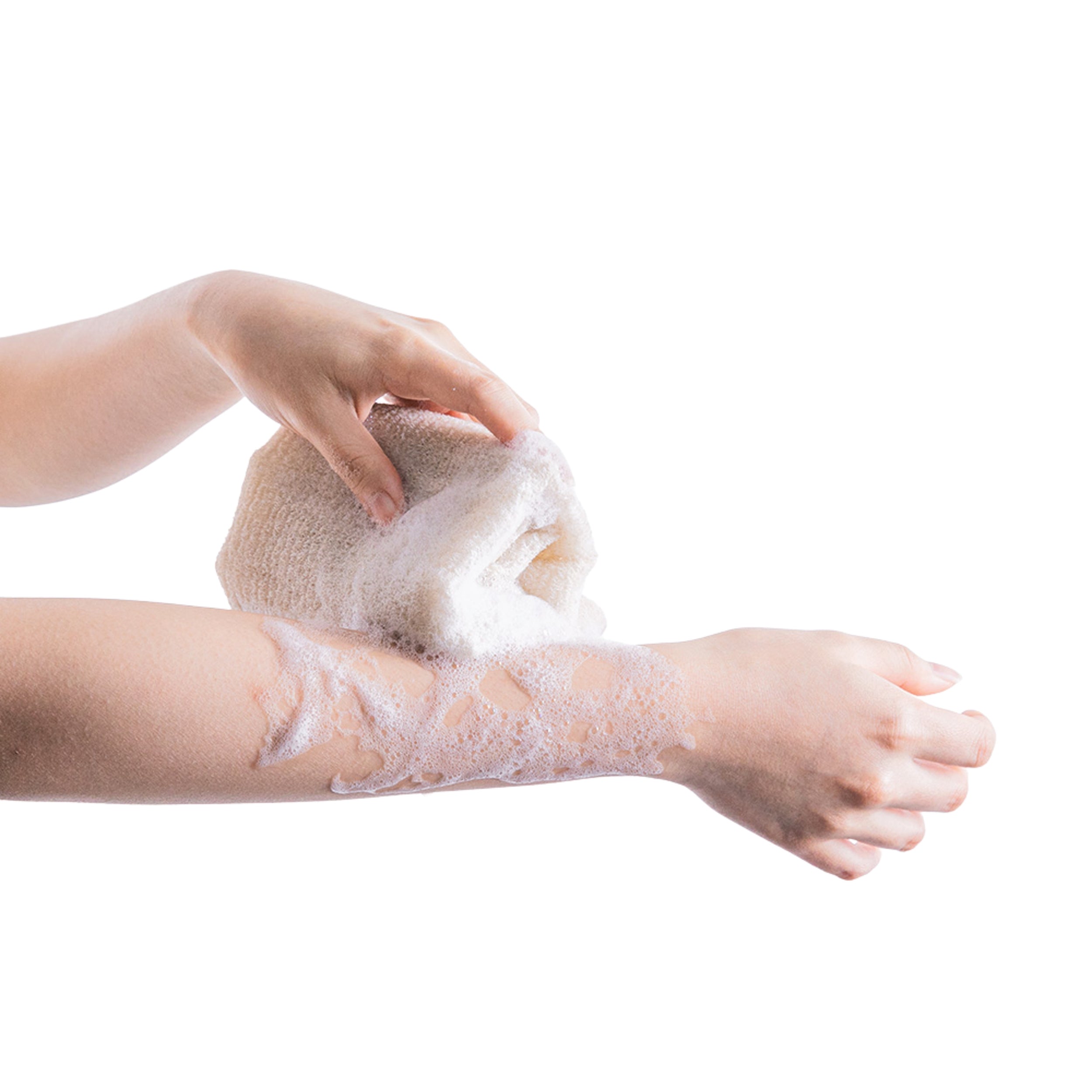 Person scrubbing their foot with a pumice stone on a white background