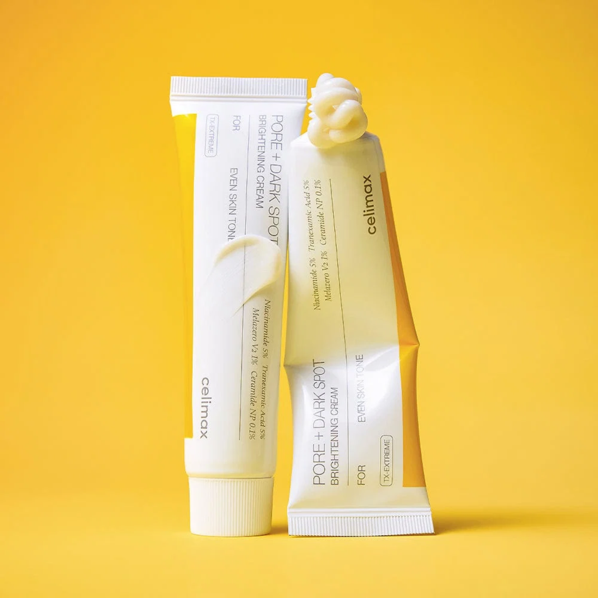 Two tubes of Celimax Pore + Dark Spot cream on a yellow background