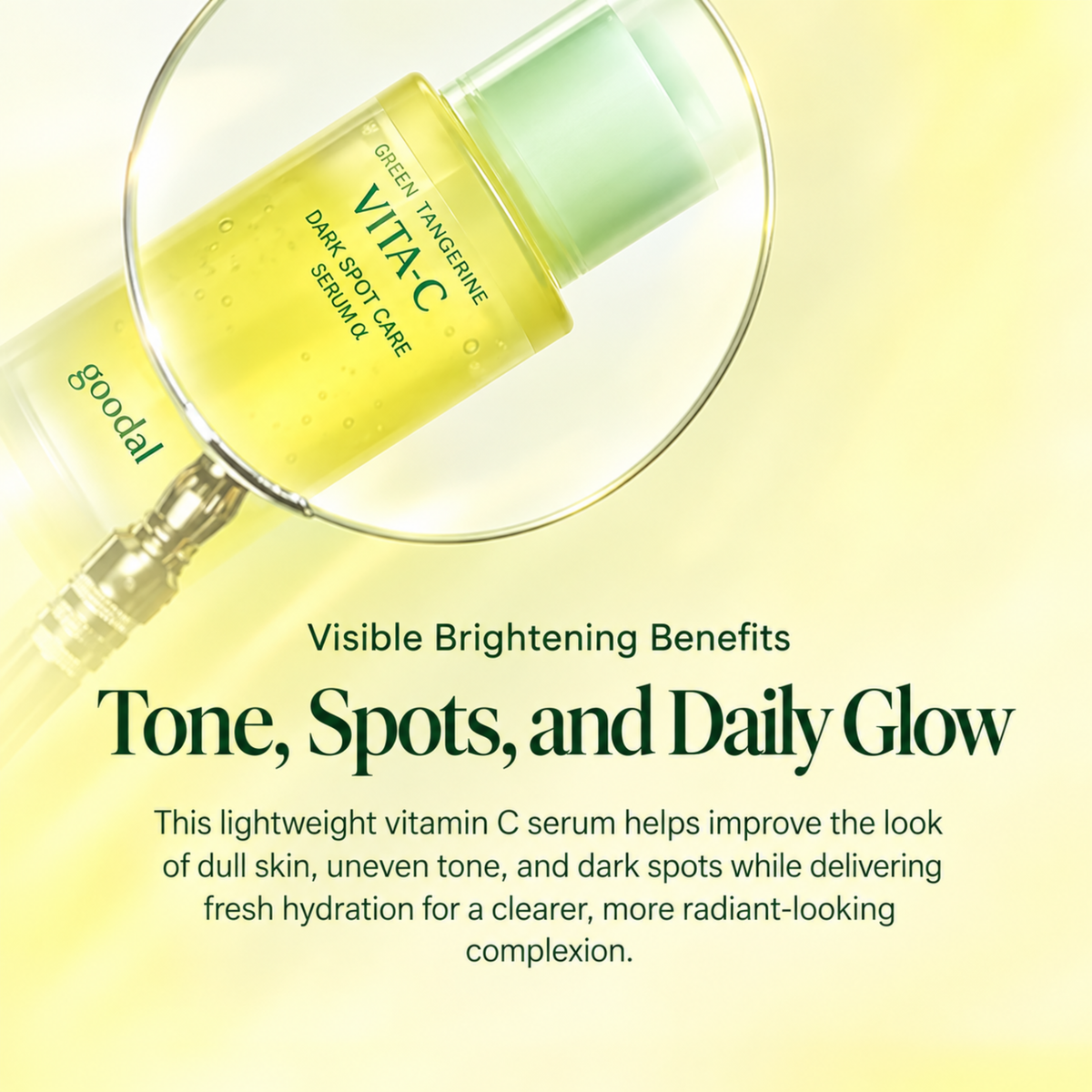 A bottle of Goodal Vitac Green Tangscine Daily Spot Care Vitamin C Serum is shown under a magnifying glass against a soft yellow background, with promotional text below.