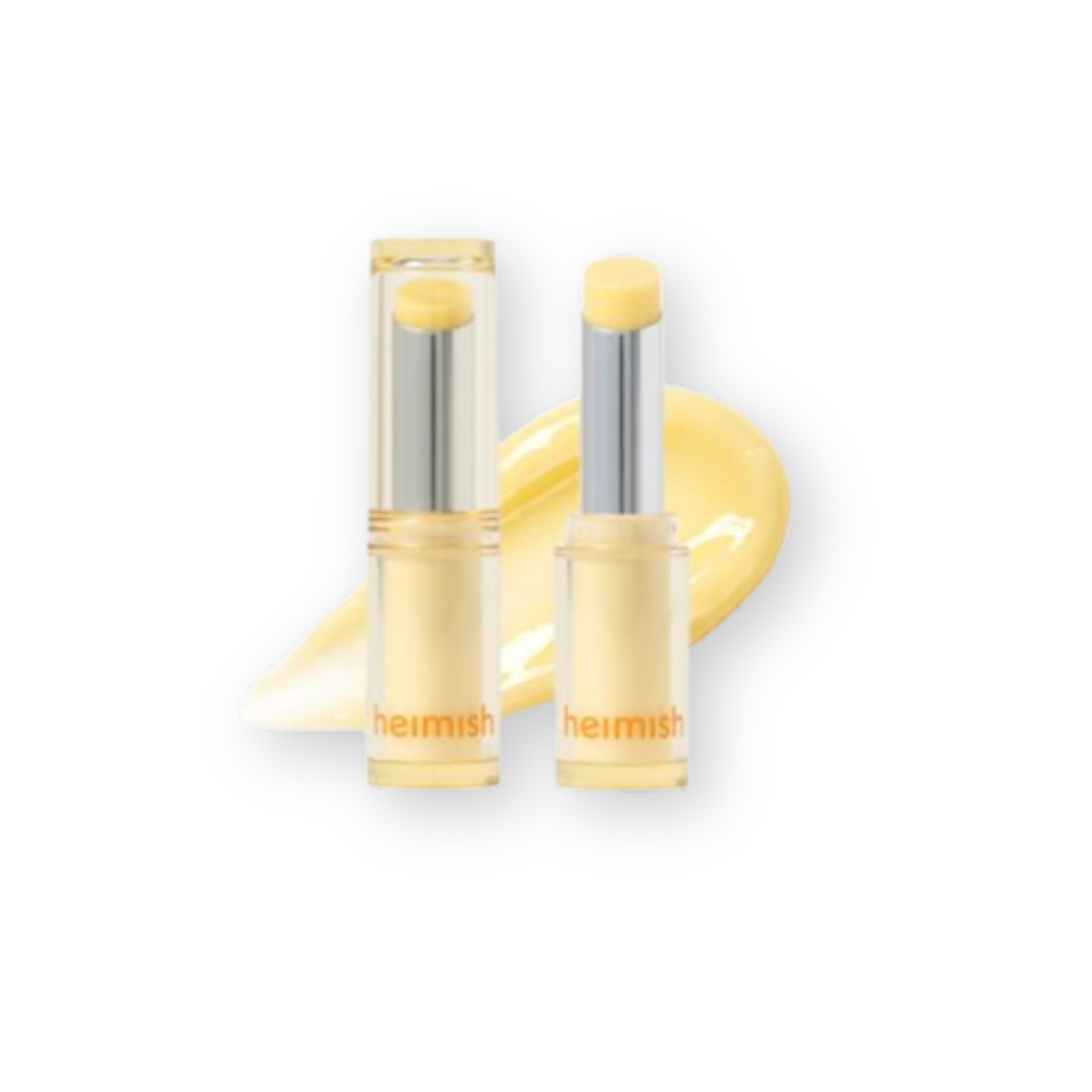 Two clear tubes of Heimish lip balm with pale yellow cream visible inside, shown on a white background with a matching cream smear behind them.