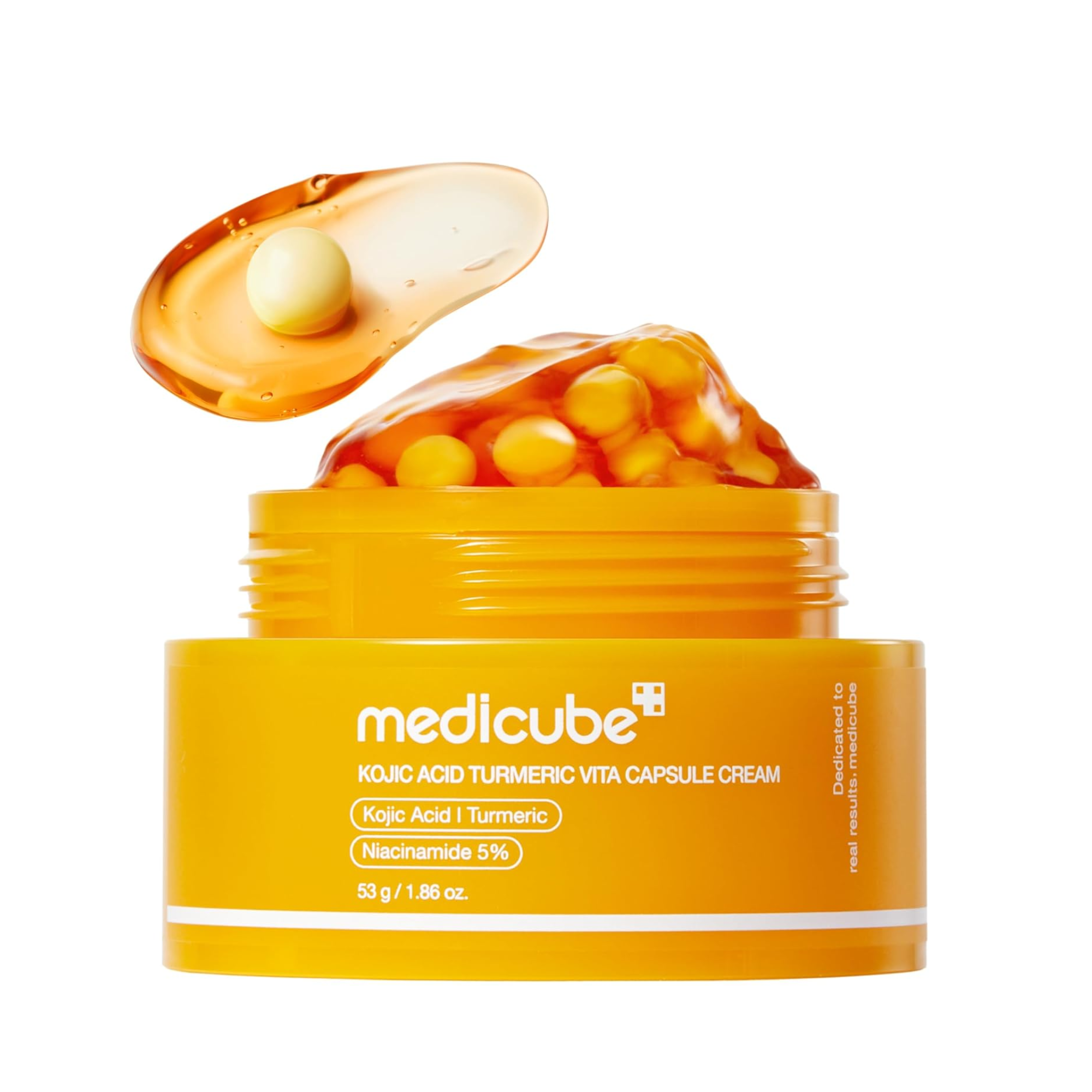 Yellow jar of Medicube cream with capsules on a white background