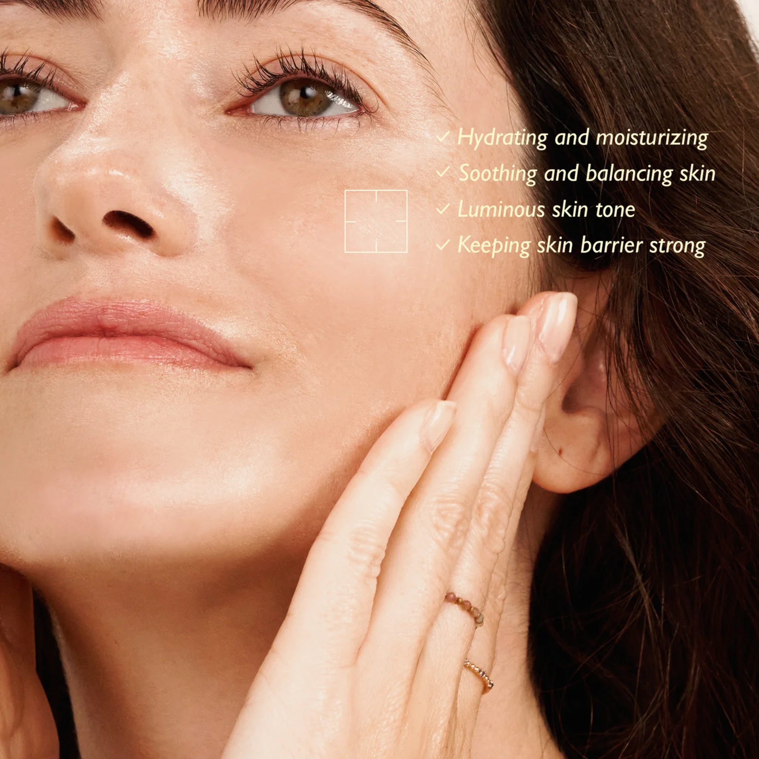 Close-up of a woman's face with text highlighting skincare benefits.