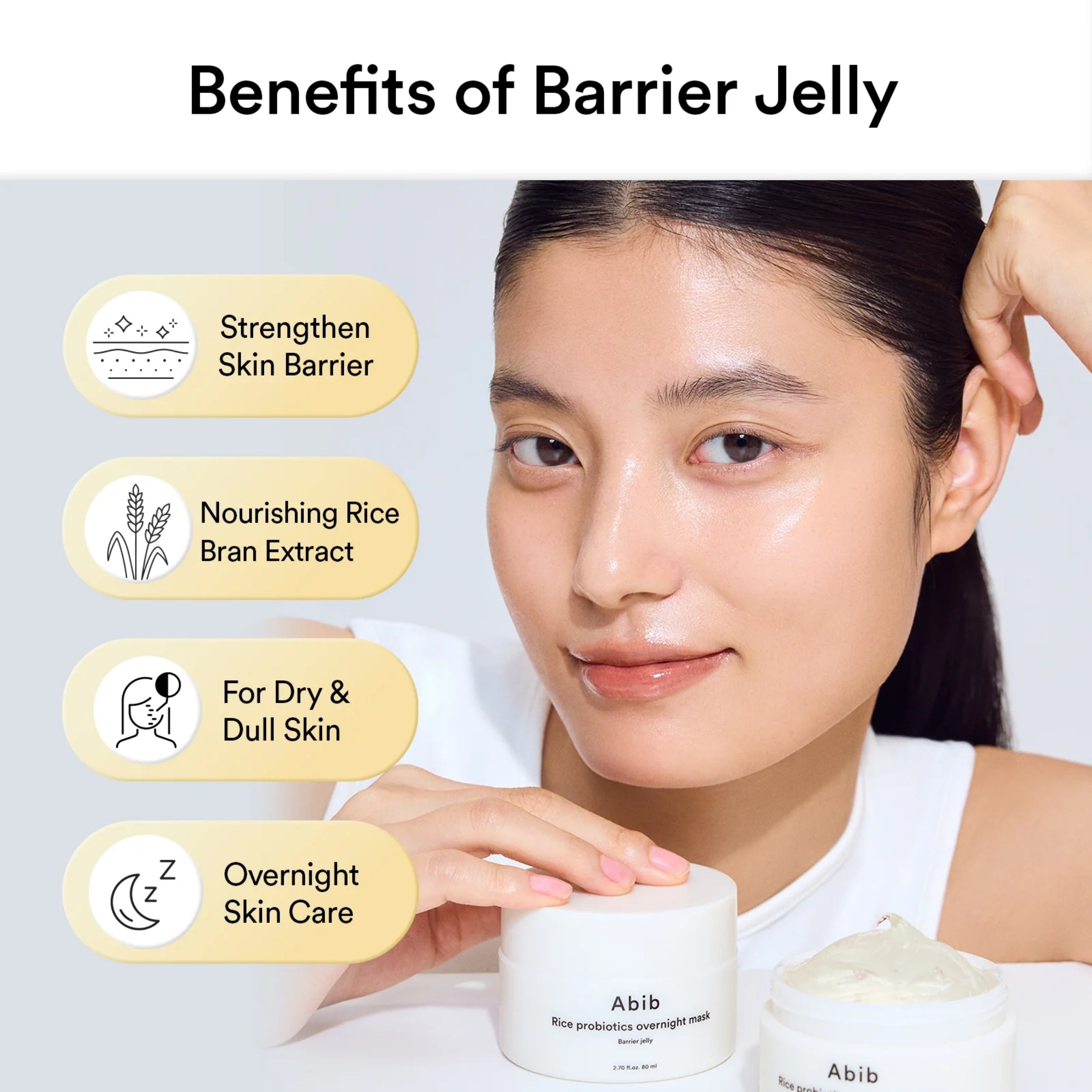 Woman holding a jar of Abib barrier jelly with text highlighting its benefits on a light gray background.