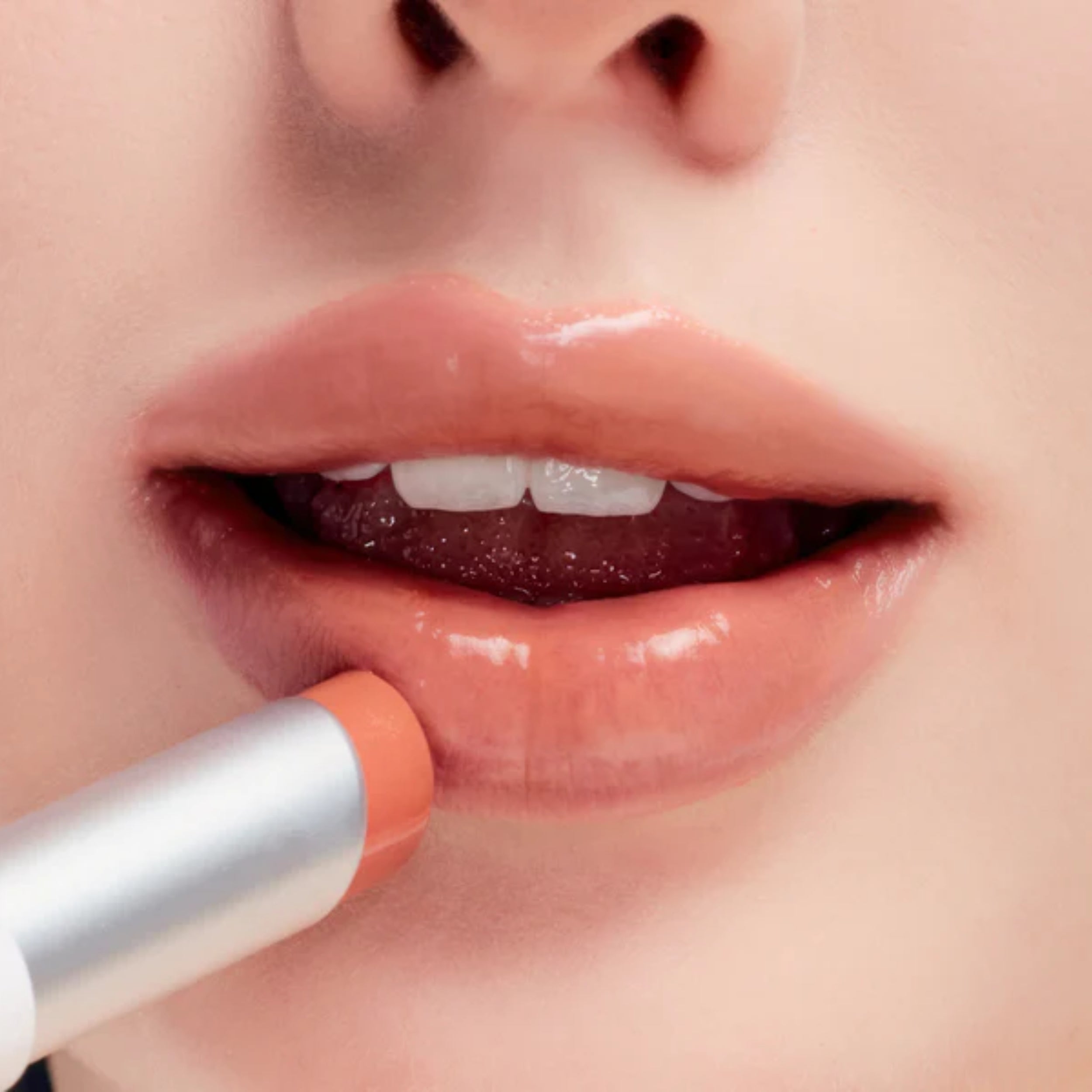 rom&nd glasting melting balm kaya fig on lips